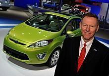 Ford Motor Company, president and CEO, Alan Mulally standing next to a 2011 Fiesta on display at the Washington DC Auto Show.